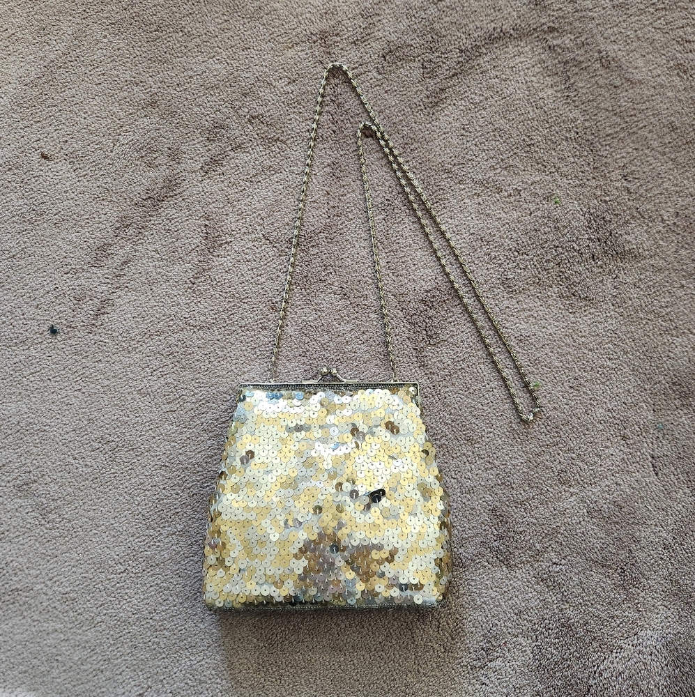 Gold sequin clutch bag with silver chain strap